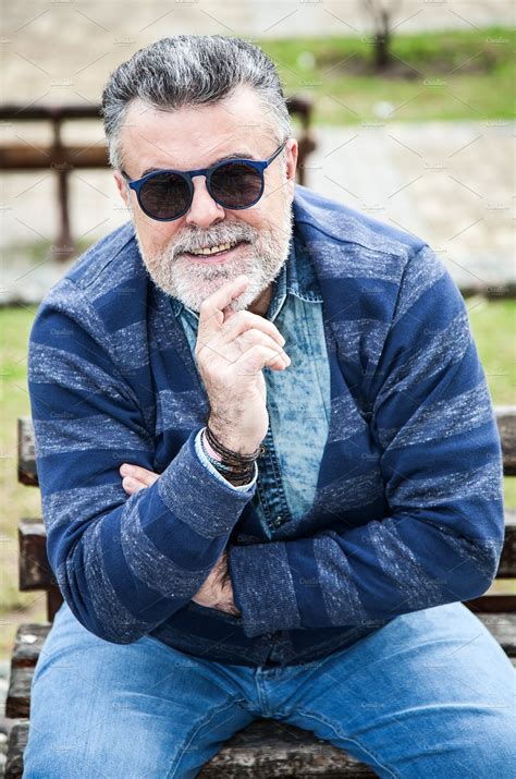 attractive old man with beard featuring handsome clothing and