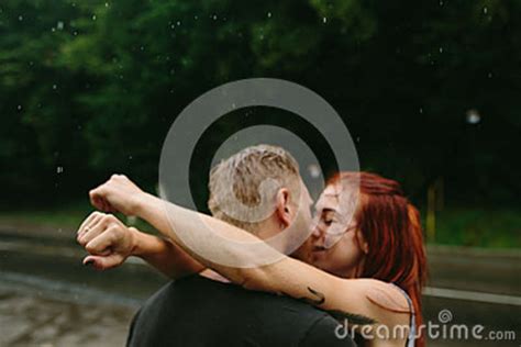 Beautiful Couple Kissing In The Rain Stock Image Image