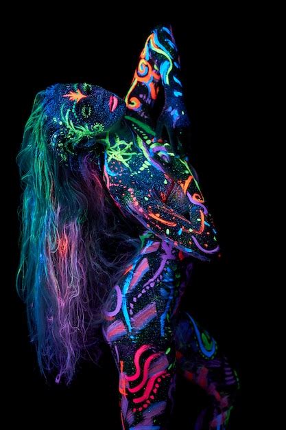 Premium Photo Art Woman Body Art On The Body Dancing In Ultraviolet