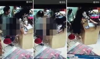 chinese clothing store owner and employee caught on video