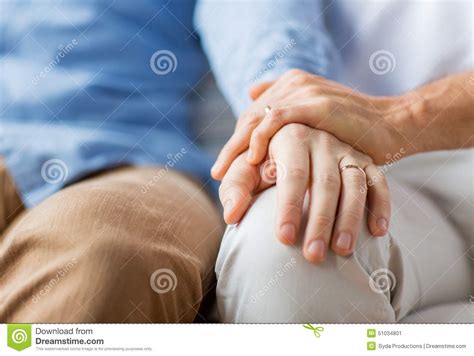 Close Up Of Happy Male Gay Couple Holding Hands Stock