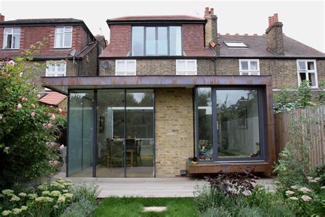 contemporary rear extension  large elevations  structural glass   steel