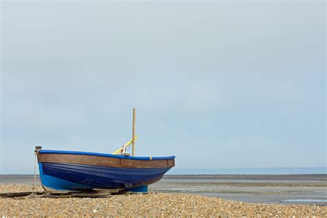 blue fishing boat  stock photo public domain pictures