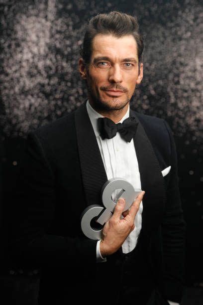 award winner style icon david gandy poses backstage at the gq men of