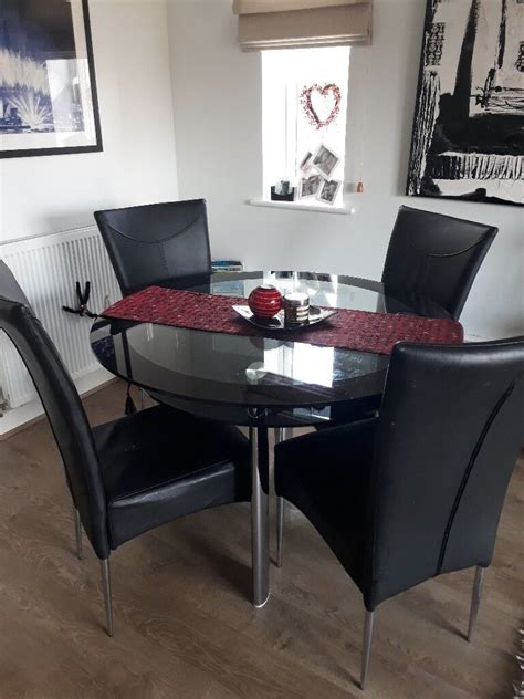 black glass dining table   chairs  ashford kent gumtree