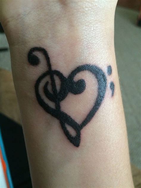 Treble And Bass Clef Heart With Semi Colon Neck Tattoo Music Tattoo