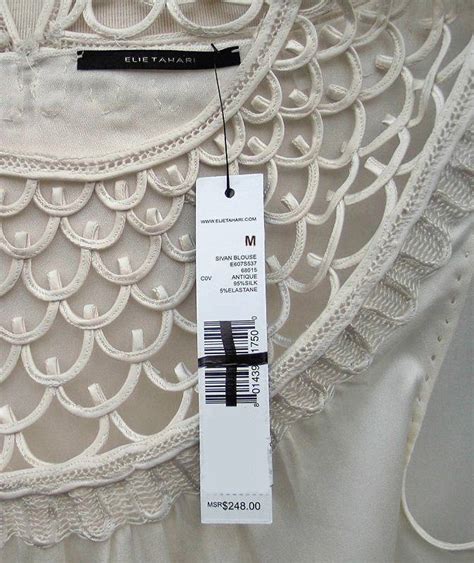 elie tahari ivory silk loop detail sivan blouse top