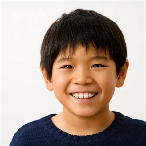 portrait  young asian boy smiling marc prenskyre framing