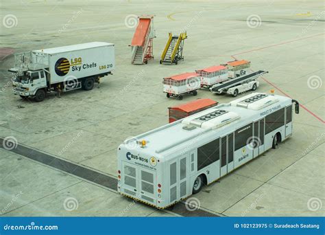 ground support equipment  bus waiting   plane editorial photo cartoondealercom