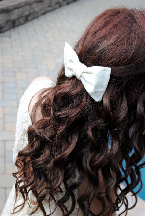 curled hair bow hairstyles