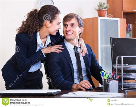 office romance between clerks at work royalty free stock