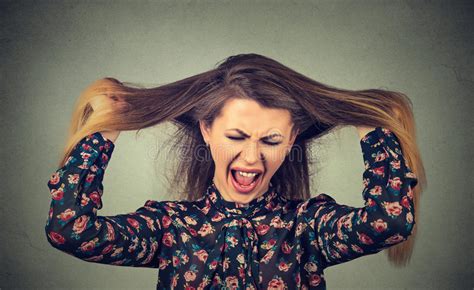 Angry Woman Pulling Her Hair Out Screaming Stock Image