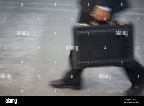 man carrying  briefcase stock photo alamy