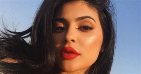 kylie jenner strips down to black underwear and gives a seductive swirl of her hair in latest