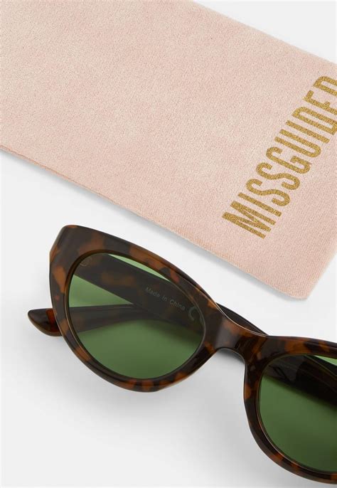 brown mock tortoiseshell oval cateye sunglasses missguided