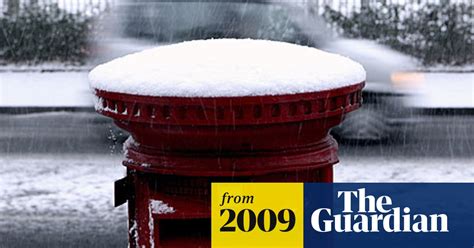 snow disrupts christmas deliveries uk weather the guardian
