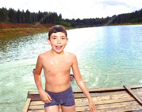 boy swimming   lake   summer country holiday stock photo