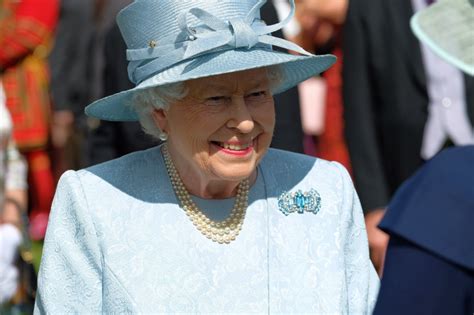 Queen Elizabeth Looks Brilliant In Blue And Prince Philip Wears A Top
