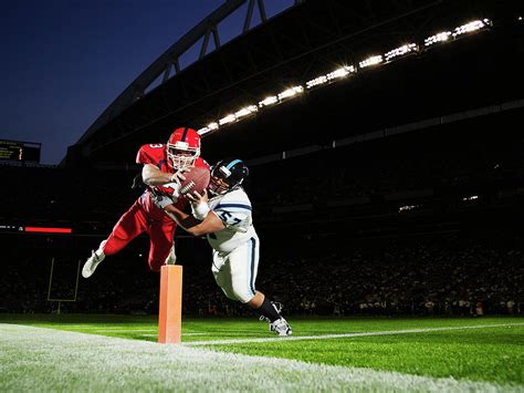 Football Player Diving Into End Zone By Thomas Barwick