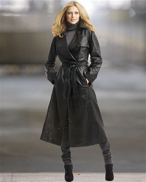 Photo Of Victoria Beckham Wearing Black Leather Trench Coat In Paris
