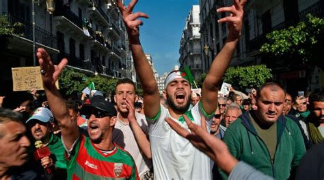 algerian protesters call for mass trials of former current officials