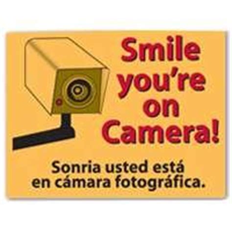 amazoncom smile youre  camera sign    street signs