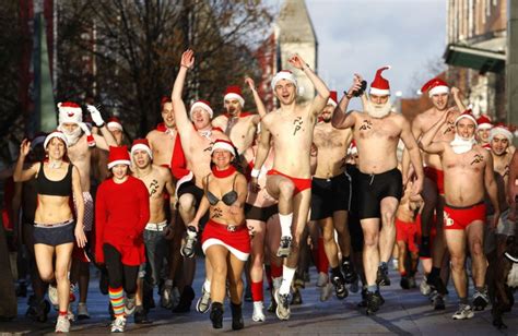 People Take Part In A Half Naked ‘santa Run’