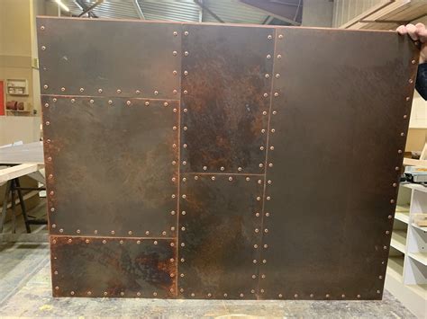 riveted aged copper panel metal wall panel metal door wall paneling