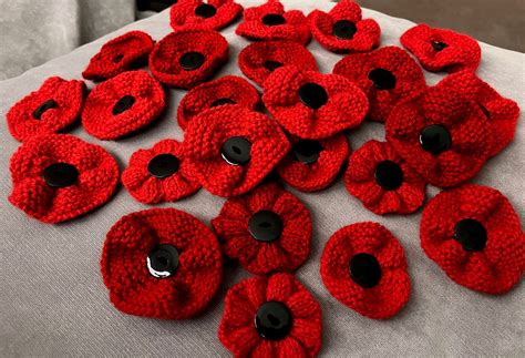 knitted poppies supporting  royal british legion backed