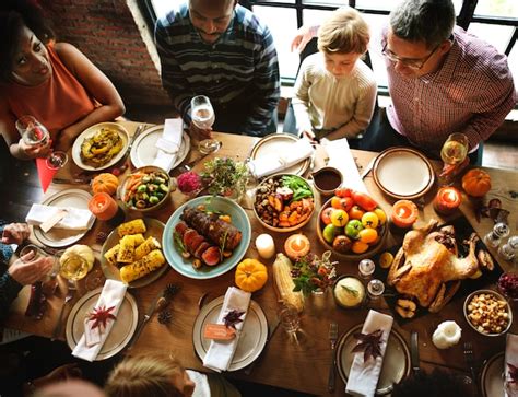 premium photo people celebrating thanksgiving holiday tradition concept