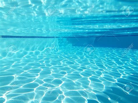 underwater shot   large clean friendly pool stock photo swimming calypso blue pool
