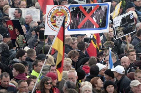 european migrant crisis german   pegida group grows  strength   anniversary