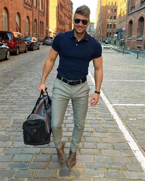 mens street style blue polo shirt light grey suit pants leather boots visit