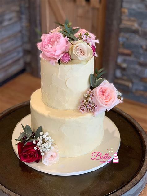 two tier rustic buttercream wedding cake