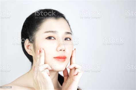 portrait of asian woman with a beautiful face and fresh skin stock