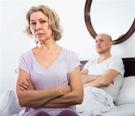 Mature Couple Having Quarrel In Bedroom Stock Image Image Of Adults