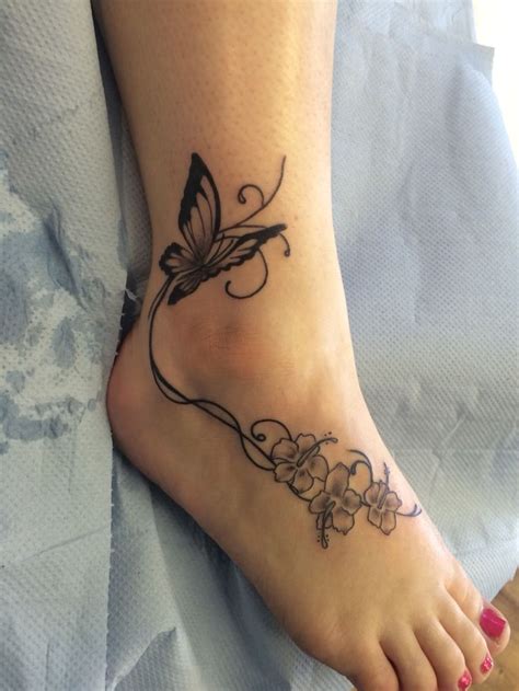 the 25 best flower foot tattoos ideas on pinterest white foot tattoos foot tattoos and lotus