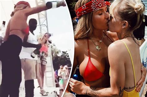 niykee heaton pours champagne before lesbian kiss at wild pool party