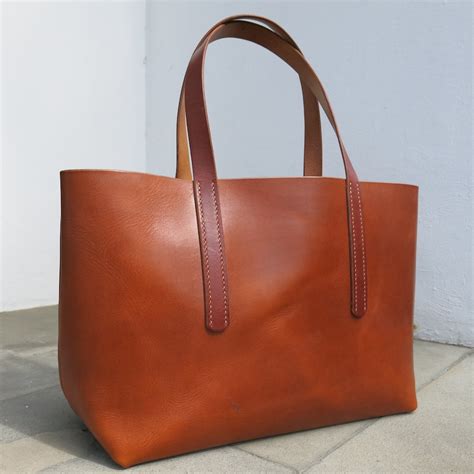 leather tote bag   style travel collecting  food blog