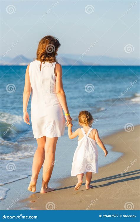 mother  daughter   beach royalty  stock photography image