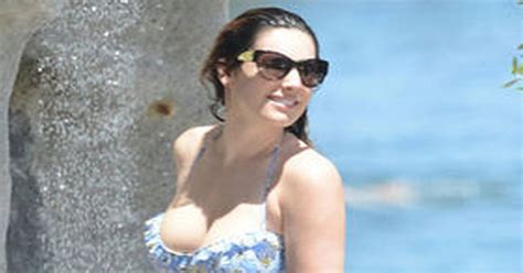 kelly brook sizzles in the sun with thom evans daily star