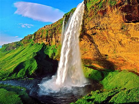 top amazing places  earth seljalandsfoss waterfall  beautiful