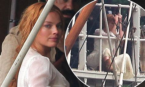 margot robbie is tied up as she plays jane porter on the uk set of tarzan daily mail online