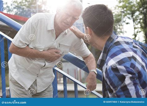 senior man needing  aid stock photo image  emergency infarction