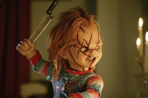 first cult of chucky image points a finger at chucky
