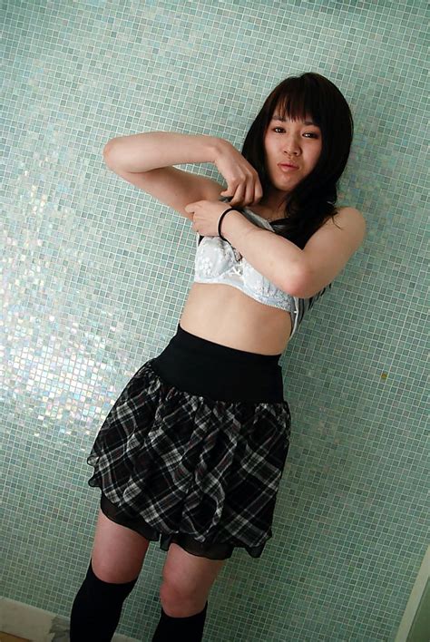 asian teen kasumi minasawa undressing and spreading her lower lips in close up