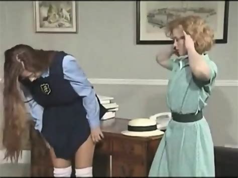 Lesbian Headmistress Naughty Spanking And Fingering Her Cute