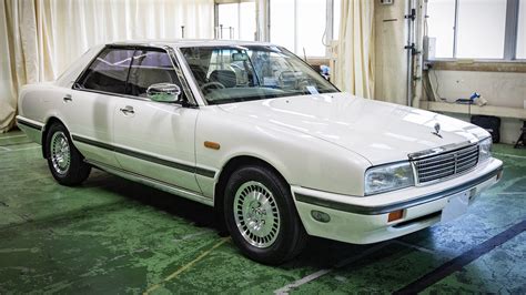 nissan cima  actress kazue itoh   factory restored japanese nostalgic car