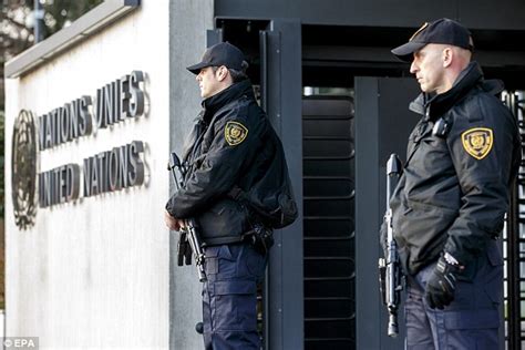 police hunt paris massacre suspects  genevas  building daily