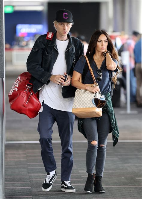Megan Fox And Machine Gun Kelly Get Cozy At Lax Airport